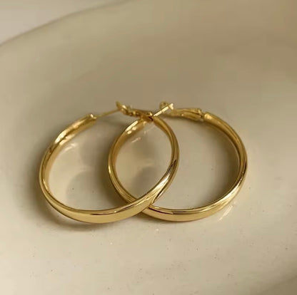 Platte hoepel oorbellen